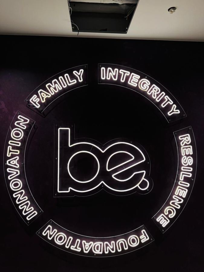 BE. Custom neon circular sign